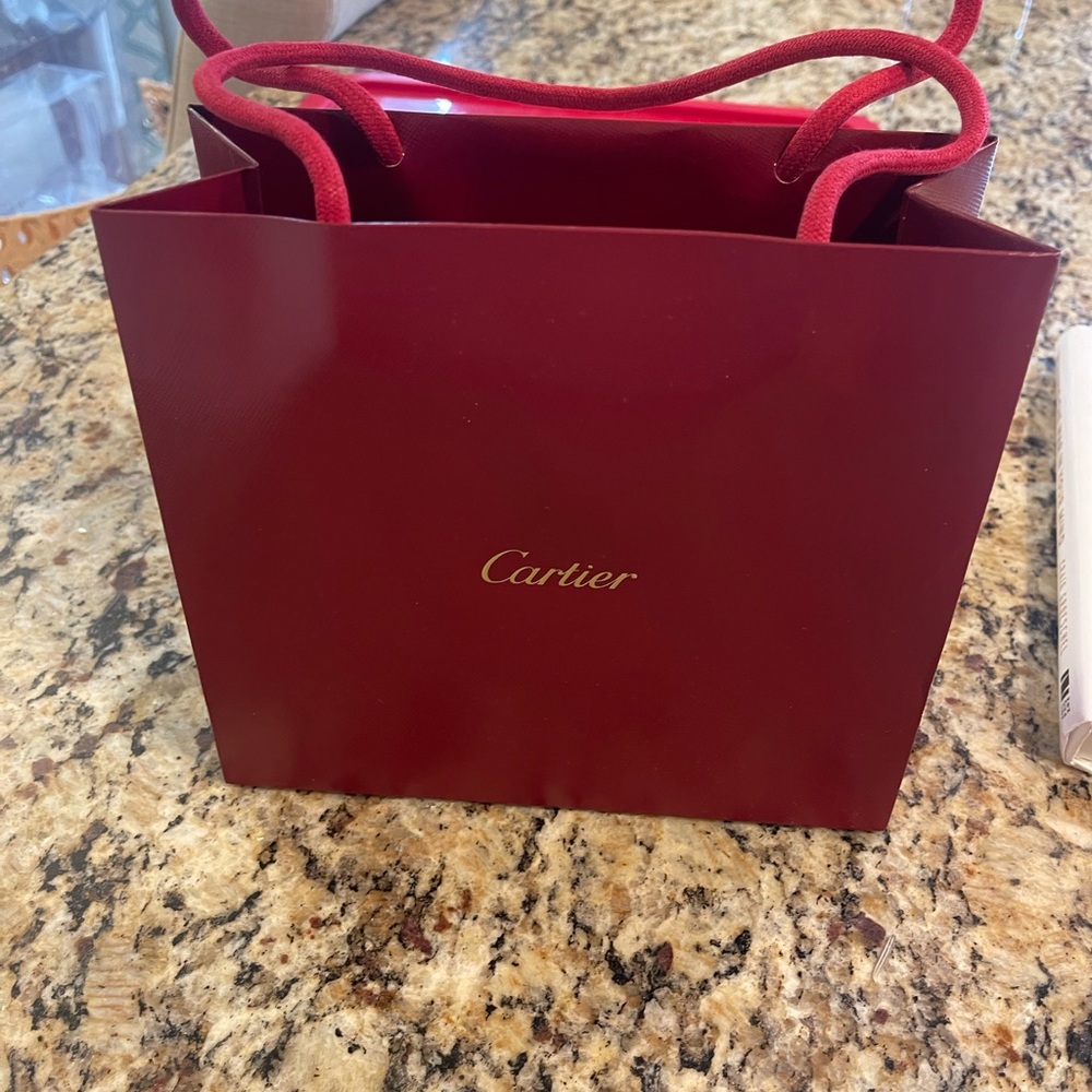 Cartier gift bag, box, dust bag, and authentication booklet